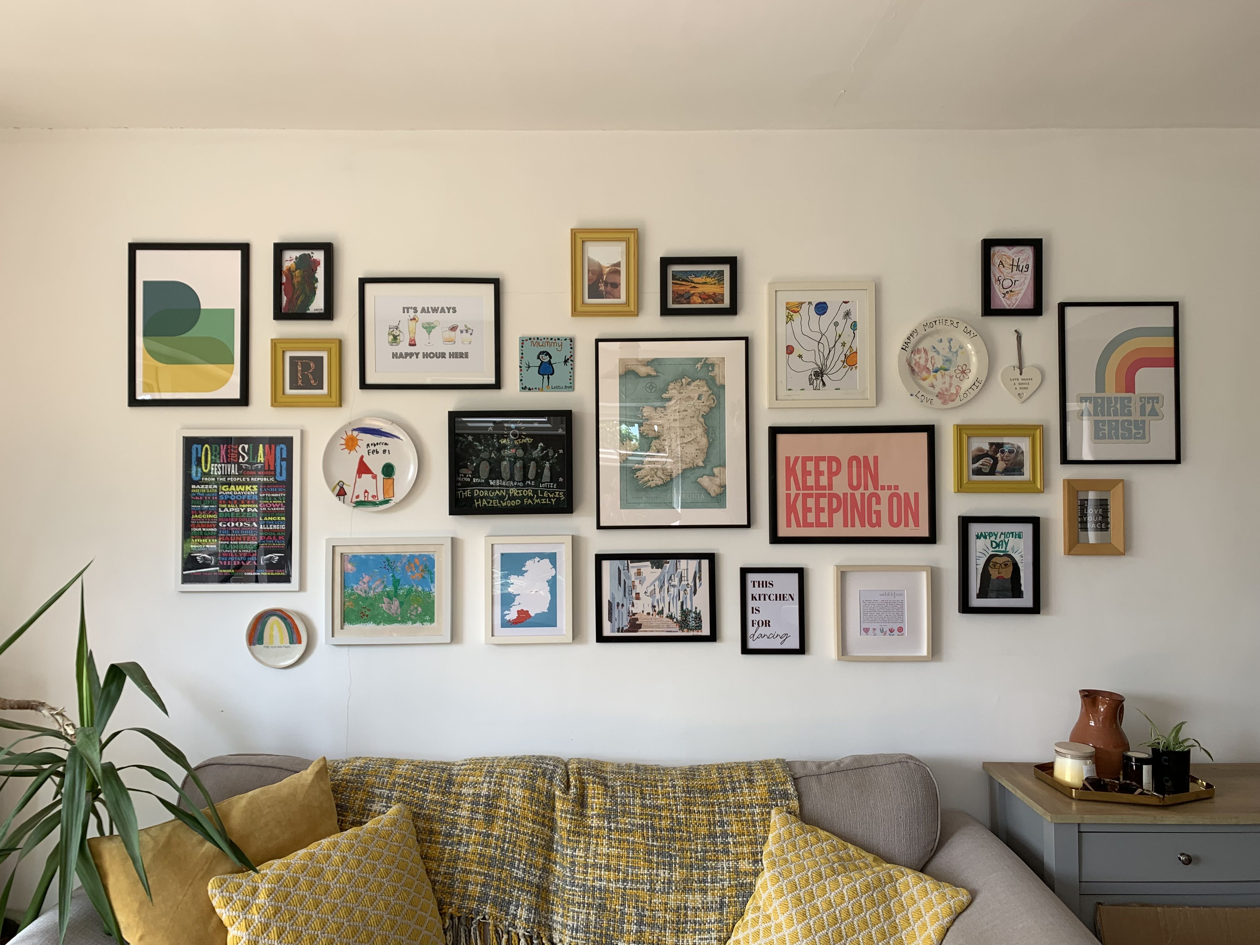 20 Stunning Picture Wall Ideas for Your Living Room That Will Steal the Show! - 19. Art Collage 1
